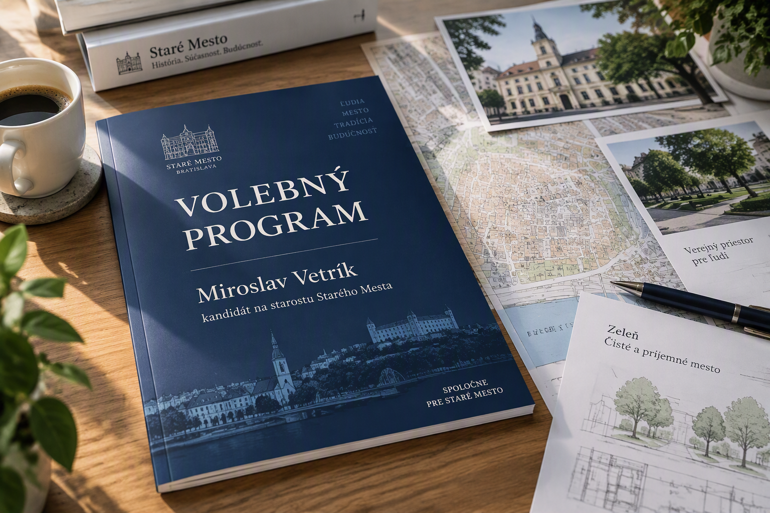 Obálka Volebného programu Miroslava Vetríka na písacom stole s mapou Starého Mesta